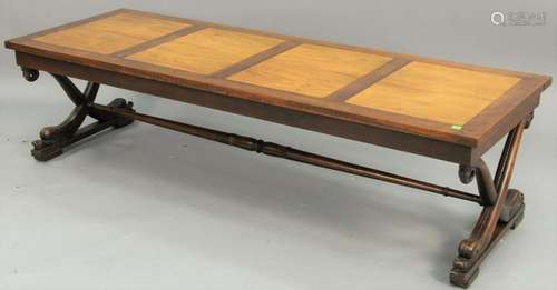 Baker Rosewood and pecan coffee table, having curule