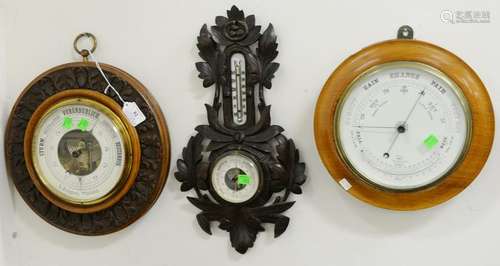 Three barometers, Sturm Veranderlich with carved walnut