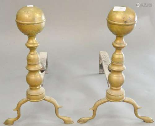 Pair of brass cannonball top andirons, with log stops,