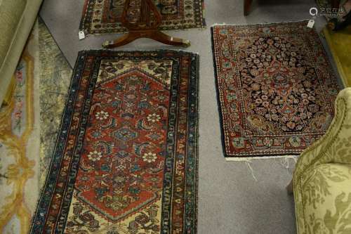 Five Oriental throw rugs. 2'7