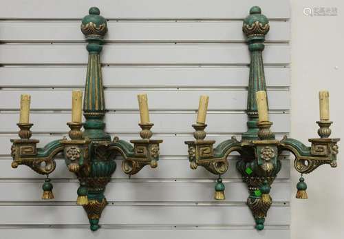 Set of four Italian Neoclassical three light sconces,