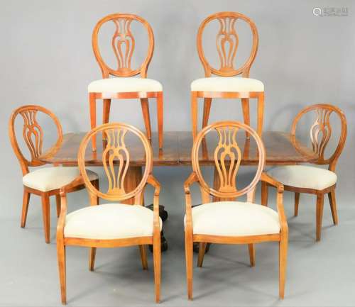 Eight piece dining set with breakfront and six chairs.