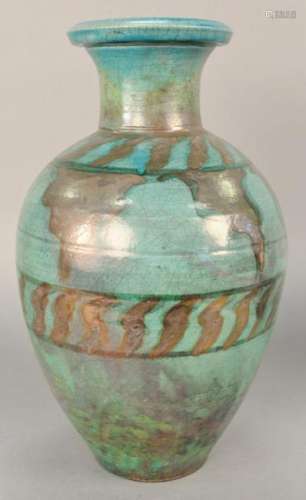 Large pottery urn, green glazed with silver designs