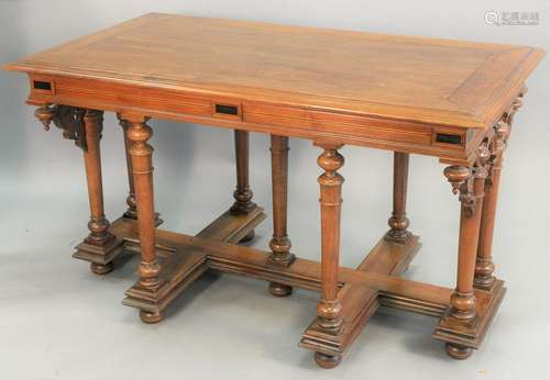 Walnut center table, on nine turned legs, ht. 30 in.,