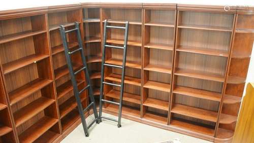 Eight section bookcases, with ladders, ht. 83 1/2 in.,