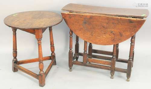 Two piece lot, to include oak circular three leg table