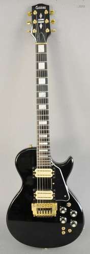 Carvin electric guitar, having a black body and six