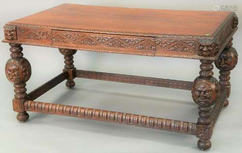 Victorian oak library table, having carved edges and