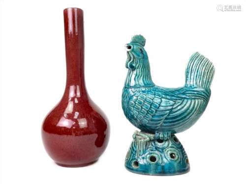 A CHINESE BLUE GLAZED COCKEREL AND A SANG DE BOEUF VASE