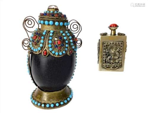 A CHINESE WHITE METAL SNUFF BOTTLE AND ANOTHER SNUFF BOTTLE