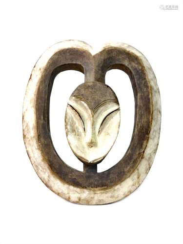 A KWELE SYMMETRICAL HORNED MASK