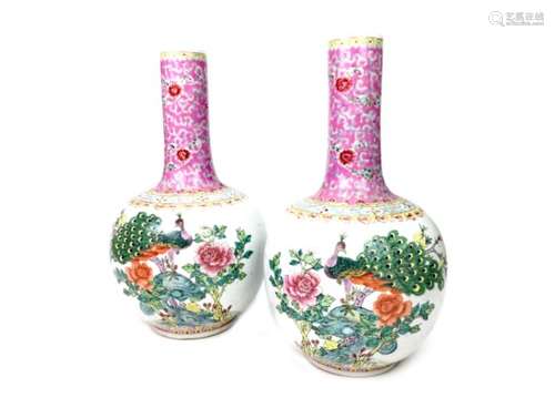 A PAIR OF EARLY 20TH CENTURY CHINESE FAMILLE ROSE VASES