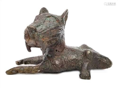 A BENIN BRONZE RECUMBENT LEOPARD