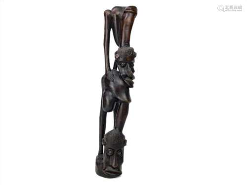 A LOT OF FIVE EARLY-MID 20TH CENTURY MAKONDE WOOD CARVINGS