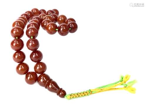 A TIBETAN BAKELITE PRAYER BEAD NECKLACE