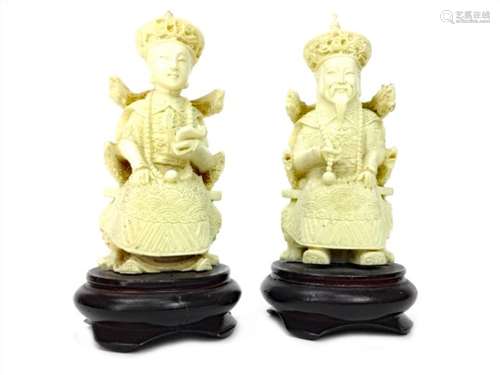 AN EARLY 20TH CENTURY CHINESE IVORY FIGURES OF EMPEROR AND EMPRESS