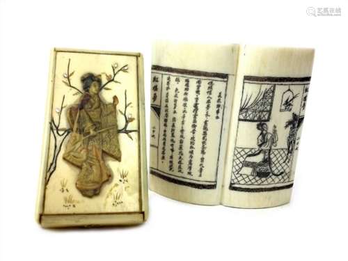 A JAPANESE IVORY STAMP BOX AND A CHINESE IVORY WRIST REST