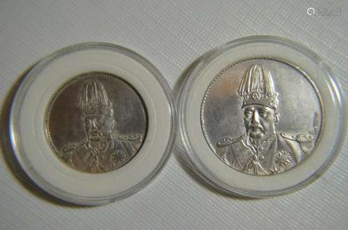 TWO CHINESE OLD SILVER COINS