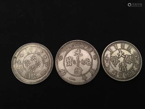 Three Chinese Coins