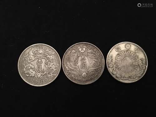 Three Chinese Coins