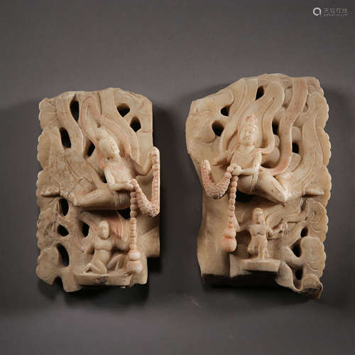 A PAIR OF ANCIENT CHINESE CARVED STONE OF FLYING FIGURES