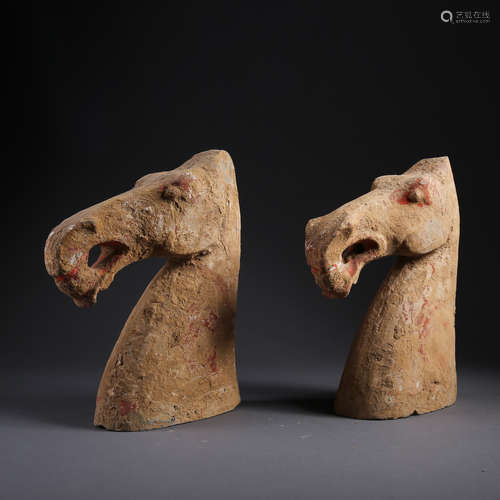 A PAIR OF ANCIENT CHINESE POTTERY HORSES