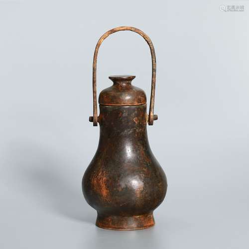 Bronze Tall Handle Pot.