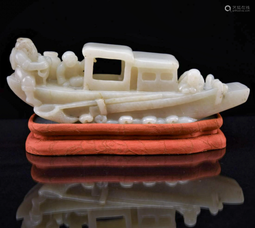 FINELY CARVED WHITE JADE RECUMBENT BOAT, 19T…