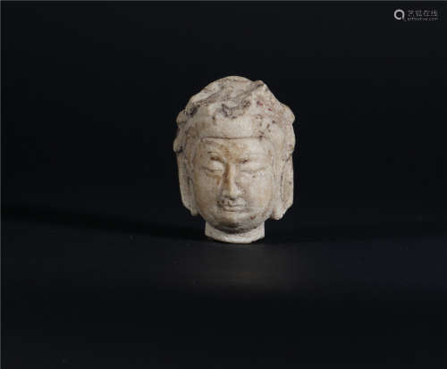 A Carved Marble Boddhisattva Head