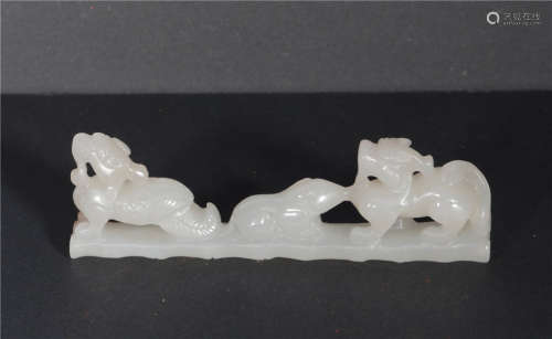 A Carved White Jade Brush-rest Qing Dynasty