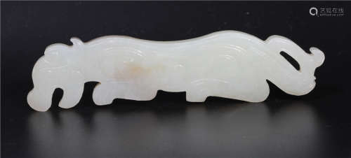 A Carved White Jade Tiger