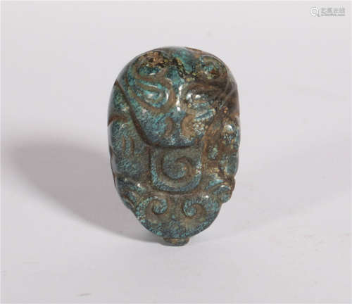 A Turquoise Pendant Tang Dynasty