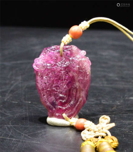 A Carved Rubellite Pendant Qing Dynasty
