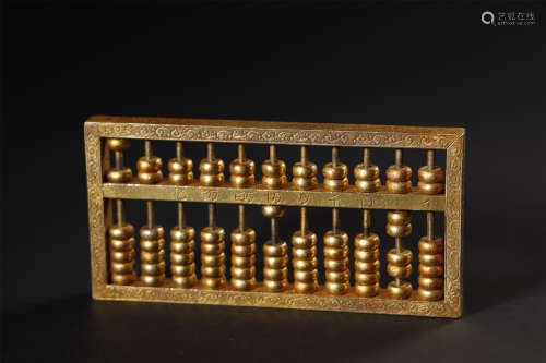 A Small Gilt Silver Abacus