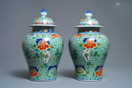 A pair of Chinese wucai vases and covers, Wa…