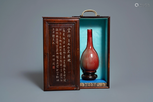 A Chinese monochrome sang-de-boeuf bottle vase in