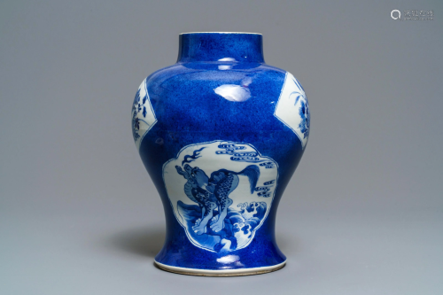 A Chinese blue and white powder blue-ground vase,