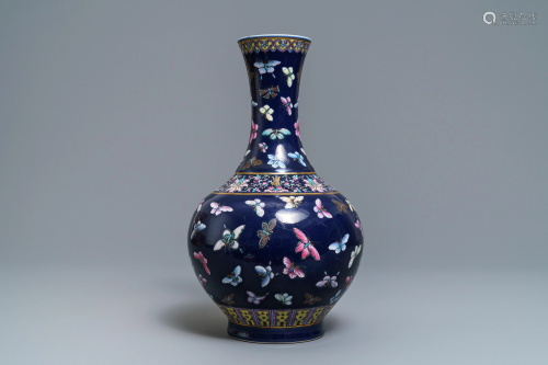 A Chinese blue-ground bottle vase with overglaze