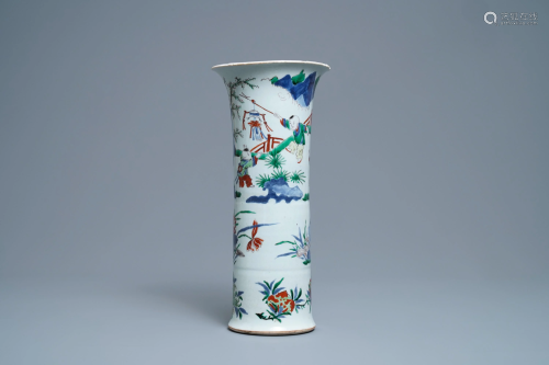A Chinese wucai gu vase with figures in a garden,