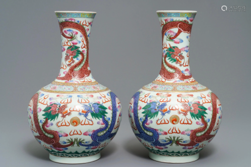 A pair of Chinese famille rose 'dragon' vases, …