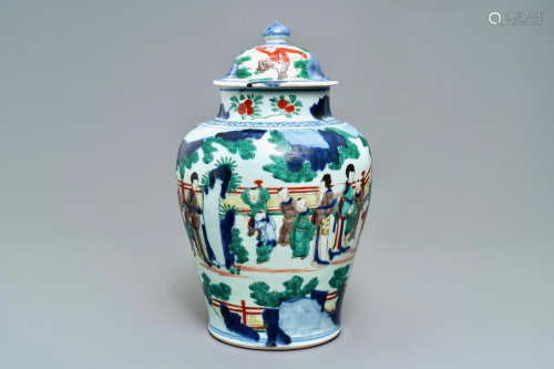 A Chinese wucai baluster vase and cover with …