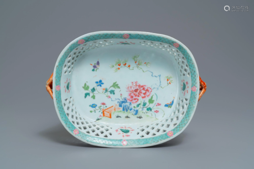 A large Chinese famille rose reticulated two- Handled