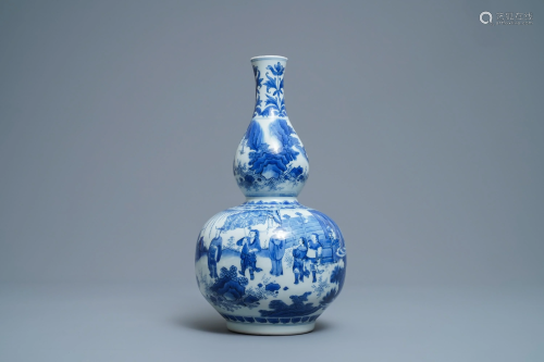 A Chinese blue and white double gourd vase,