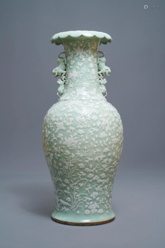 A large Chinese slip-decorated celadon-ground va…