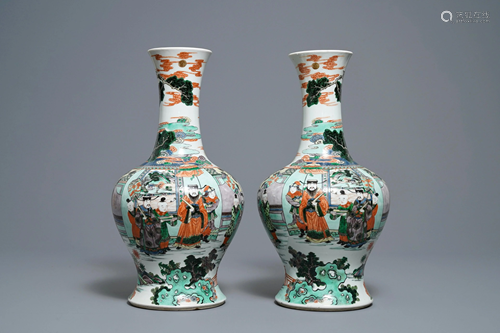 A pair of Chinese famille verte vases with figur…