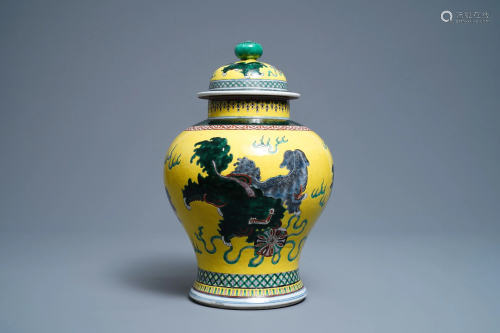 A Chinese yellow-ground famille verte vase and cover