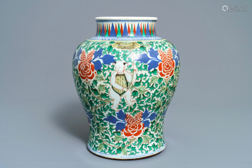 A Chinese wucai 'boys and peony scrolls' vase, 19th C.