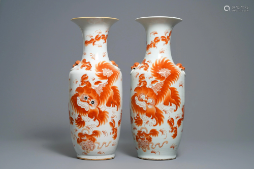 A pair of Chinese iron red 'Buddhist lions' vases,
