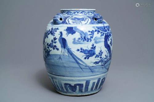 A Chinese blue and white jar with birds in a lan…