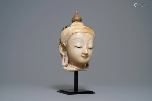 A gilt-lacquered alabaster head of Buddha, B…